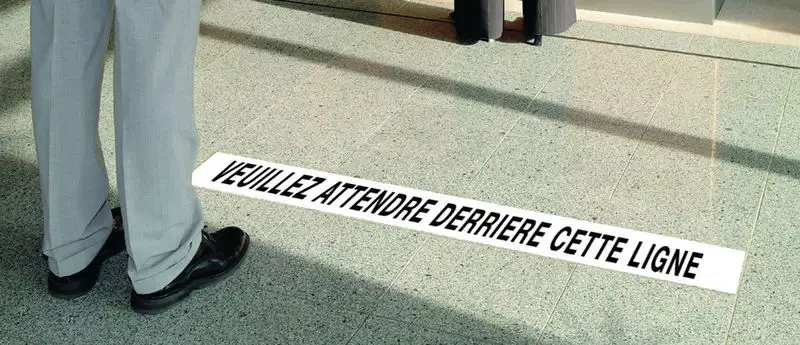 Limite de courtoisie - Veuillez attendre derrière cette ligne