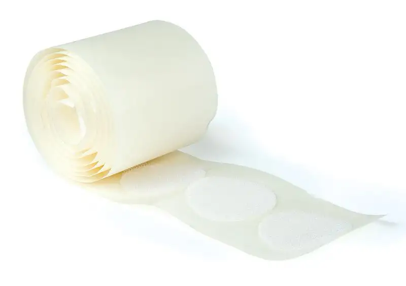 Rouleau de pastilles auto-agrippantes